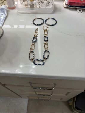 Gold Tone Animal PrinChain Necklace and Matching Hoop Earrings with Denim Accent